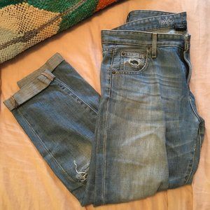 Moschino ripped stonewash jeans